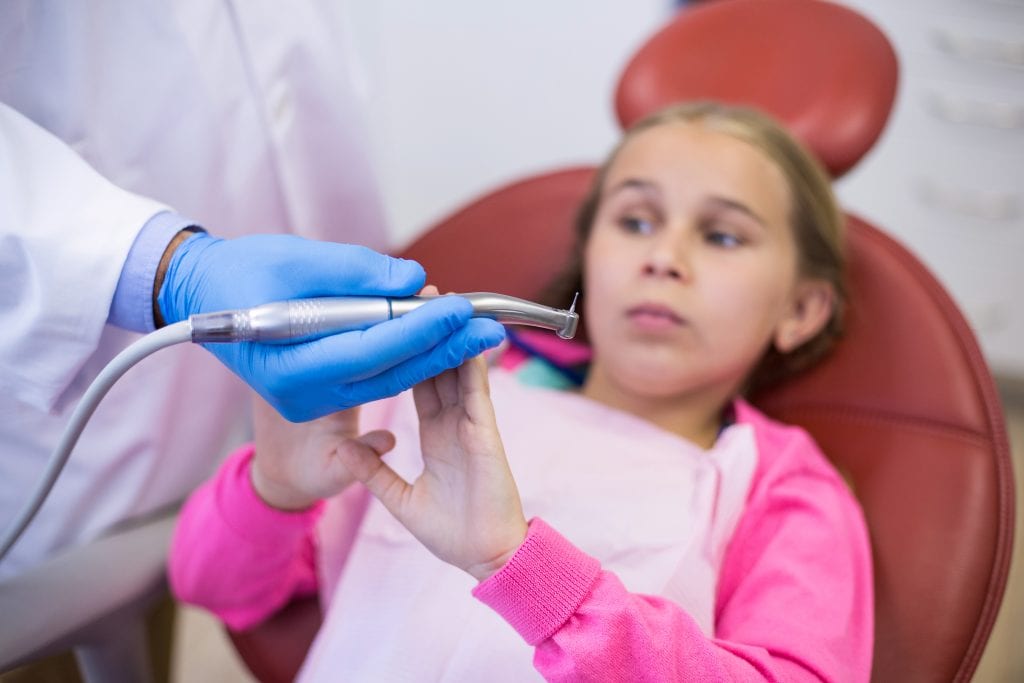 a child feeling anxious on their dental visit